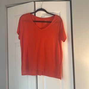 Woman’s Old Navy orange boyfriend t-shirt. Size medium.